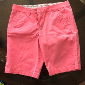 Bright pink Bermuda shorts